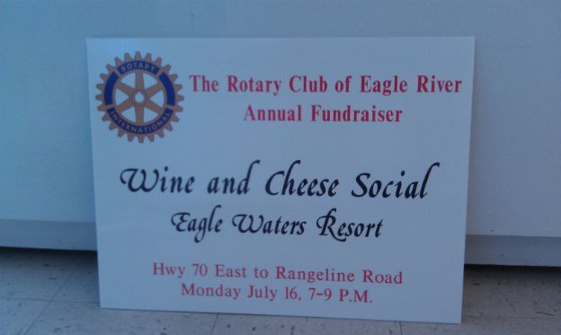 The Rotary Club of Eagle River.  Yard sign promoting an upcoming event.